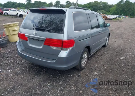2010 Honda Odyssey Ex-L z USA, uszkodzony, nr VIN 5FNRL3H78AB044087